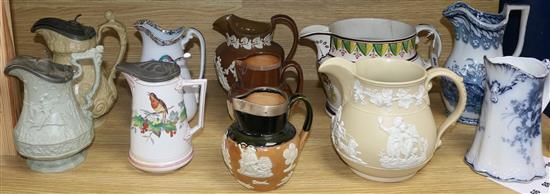 A quantity of assorted Victorian and other ceramic jugs including Doulton